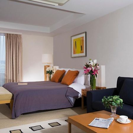 Oakwood Residence Aoyama Токио Стая снимка